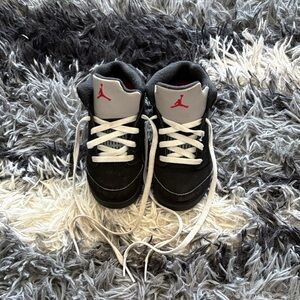 Jordan Kids Black and Gray Sneakers with Red Accent